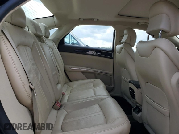 2013 Lincoln MKZ z VIN 3LN6L2GK8DR827458, wystawiony jako Copart lot #58346375 z przebiegiem 123 434 mil mil oraz Szkoda całkowita • Salvage title. Historia ofert i sprzedaży dostępna na DreamBid. Obrazek 10.