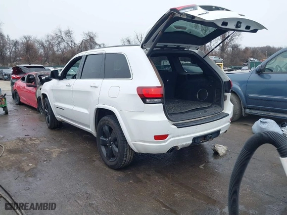 2015 Jeep Grand Cherokee Altitude with VIN 1C4RJFAG7FC954853, listed as a IAAI auction lot 40988796 with 107,002 mi miles. Bid and sale history available at carsss.com. Image 3.