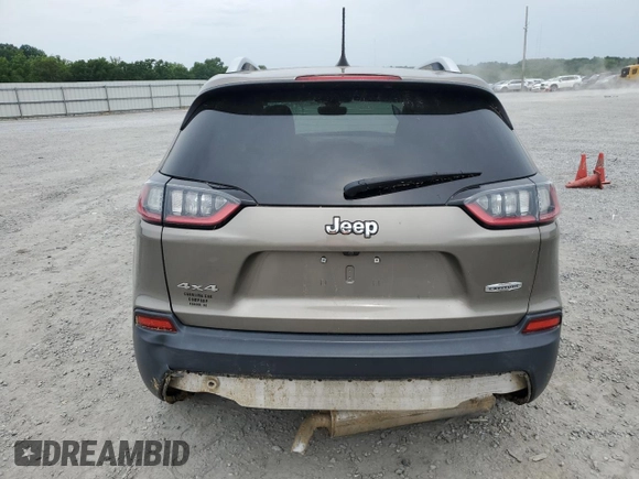 2019 Jeep Cherokee Latitude Plus with VIN 1C4PJMLB2KD169934, listed as a Copart auction lot 57332795 with 110,549 mi miles and Salvage title. Bid and sale history available at DreamBid. Image 6.