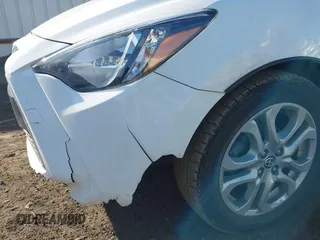 2016 Scion iA z VIN 3MYDLBZV2GY107457, wystawiony jako IAAI lot #38939578 z przebiegiem 99 928 mil mil oraz . Historia ofert i sprzedaży dostępna na DreamBid. Obrazek 17.