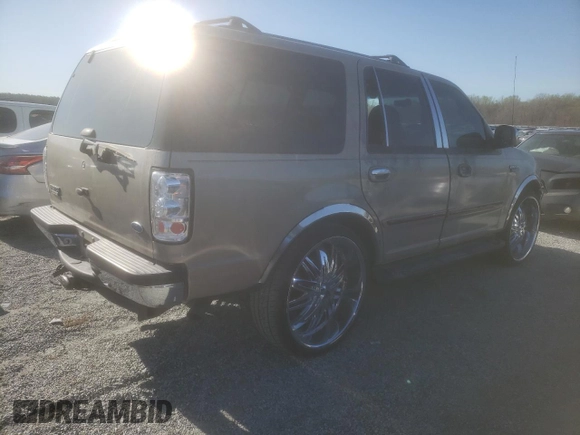 1997 Ford Expedition XLT with VIN 1FMEU1769VLC38411, listed as a Copart auction lot 50315135 with 230,863 mi miles and Salvage title. Bid and sale history available at DreamBid. Image 3.