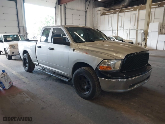 2010 Dodge Ram 1500 ST with VIN 1D7RB1GK5AS209390, listed as a IAAI auction lot 40315599 with 145,119 mi miles. Bid and sale history available at carsss.com. Image 1.