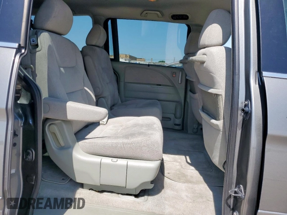 2007 Honda Odyssey EX with VIN 5FNRL38437B068697, listed as a Copart auction lot 60875505 with 211,688 mi miles and Salvage title. Bid and sale history available at DreamBid. Image 11.