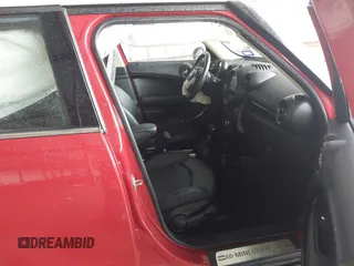 2014 MINI Countryman S with VIN WMWZC3C53EWP27111, listed as a IAAI auction lot 42192799 with 136,945 mi miles and . Bid and sale history available at DreamBid. Image 5.
