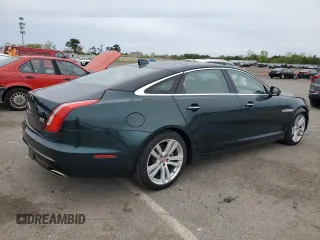 2018 Jaguar XJ Portfolio with VIN SAJWJ2GD9J8W15663, listed as a Copart auction lot 56734515 with 9,374 mi miles and Salvage Title. Bid and sale history available at DreamBid. Image 3.