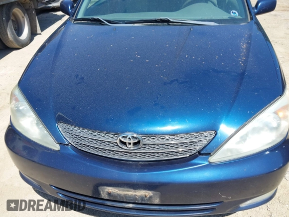 2003 Toyota Camry LE with VIN 4T1BE32K13U204938, listed as a IAAI auction lot 42194548 with 263,710 mi miles and . Bid and sale history available at DreamBid. Image 6.
