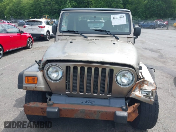 2005 Jeep Wrangler Sport with VIN 1J4FA49SX5P317120, listed as a IAAI auction lot 42677397 with 71,403 mi miles and . Bid and sale history available at DreamBid. Image 6.