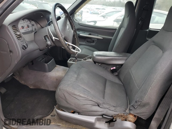 2001 Ford Explorer Sport z VIN 1FMYU60E91UC17672, wystawiony jako Copart lot #86739594 z przebiegiem 232 066 mil mil oraz Tytuł czysty. Historia ofert i sprzedaży dostępna na DreamBid. Obrazek 7.