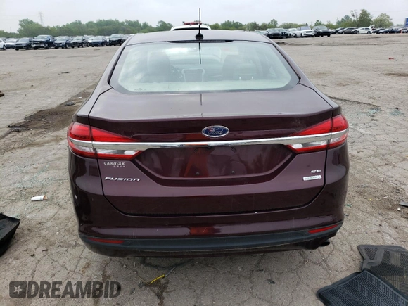 2018 Ford Fusion SE z VIN 3FA6P0HD2JR185298, wystawiony jako Copart lot #58898075 z przebiegiem Nie podano mil oraz Czysty tytuł • Clean title. Historia ofert i sprzedaży dostępna na DreamBid. Obrazek 6.