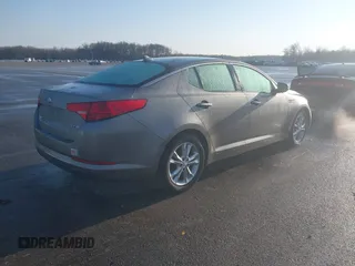 2013 Kia Optima EX with VIN 5XXGN4A77DG101902, listed as a IAAI auction lot 42001996 with 143,469 mi miles and . Bid and sale history available at DreamBid. Image 4.