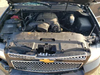 2014 Chevrolet Tahoe LTZ с VIN 1GNSKCE07ER137878, выставлен на аукционе Copart как лот 59905605 с пробегом 213 584 миль миль и Списание • Salvage title. История ставок и продаж доступна на DreamBid. Изображение 12.