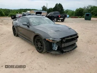 2019 Ford Mustang EcoBoost z VIN 1FA6P8TH8K5143490, wystawiony jako Copart lot #57561905 z przebiegiem 126 460 mil mil oraz Szkoda całkowita • Salvage title. Historia ofert i sprzedaży dostępna na DreamBid. Obrazek 14.