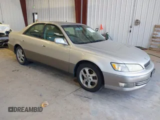 2001 Lexus ES 300 with VIN JT8BF28G710305676, listed as a IAAI auction lot 42142188 with 210,453 mi miles. Bid and sale history available at carsss.com. Image 1.