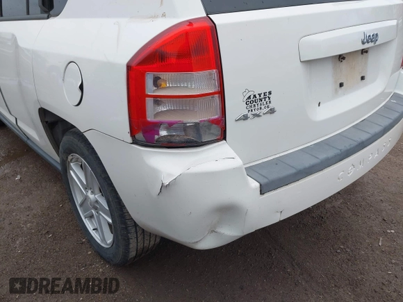 2007 Jeep Compass Sport with VIN 1J8FF47W27D138211, listed as a IAAI auction lot 41959389 with 165,834 mi miles. Bid and sale history available at carsss.com. Image 6.