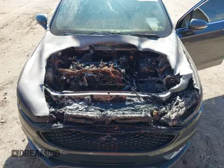 2017 Ford Fusion Titanium with VIN 3FA6P0K98HR124035, listed as a IAAI auction lot 42307936 with Not provided miles and . Bid and sale history available at DreamBid. Image 6.