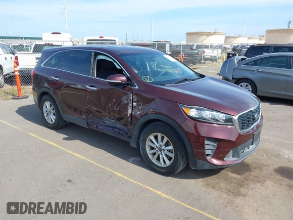 2019 Kia Sorento LX z VIN 5XYPG4A58KG565461, wystawiony jako IAAI lot #42099618 z przebiegiem 42 574 mil mil oraz . Historia ofert i sprzedaży dostępna na DreamBid. Obrazek 1.