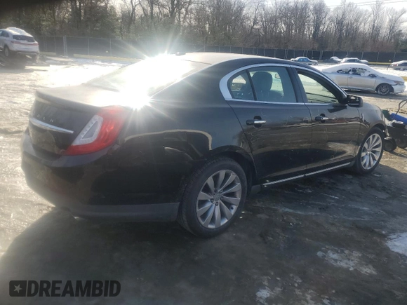 2016 Lincoln MKS z VIN 1LNHL9DK0GG600153, wystawiony jako Copart lot #41561325 z przebiegiem 71 909 mil mil oraz Szkoda całkowita • Salvage title. Historia ofert i sprzedaży dostępna na DreamBid. Obrazek 3.