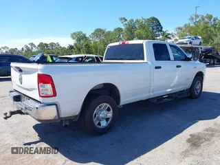 2021 Ram 2500 Tradesman z VIN 3C6UR4HJ3MG501081, wystawiony jako IAAI lot #41853135 z przebiegiem 70 421 mil mil oraz . Historia ofert i sprzedaży dostępna na DreamBid. Obrazek 4.