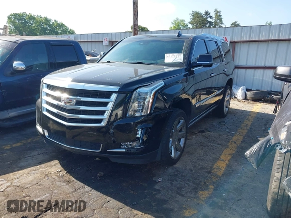 2017 Cadillac Escalade Premium Luxury with VIN 1GYS3CKJ2HR121993, listed as a IAAI auction lot 42172777 with 157,494 mi miles and . Bid and sale history available at DreamBid. Image 2.