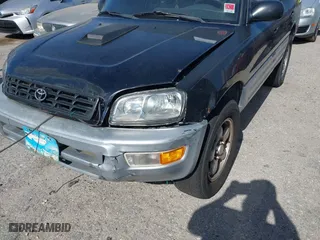 1998 Toyota RAV4 with VIN JT3GP10V7W7037711, listed as a IAAI auction lot 42081313 with 233,554 mi miles. Bid and sale history available at carsss.com. Image 6.