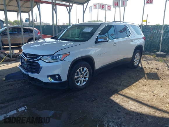 2018 Chevrolet Traverse LT Cloth z VIN 1GNEVGKWXJJ270664, wystawiony jako IAAI lot #42176492 z przebiegiem 73 534 mil mil oraz . Historia ofert i sprzedaży dostępna na DreamBid. Obrazek 19.