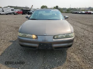 2000 Oldsmobile Intrigue GL z VIN 1G3WS52H4YF210758, wystawiony jako Copart lot #70872454 z przebiegiem 103 298 mil mil oraz Tytuł czysty. Historia ofert i sprzedaży dostępna na DreamBid. Obrazek 5.