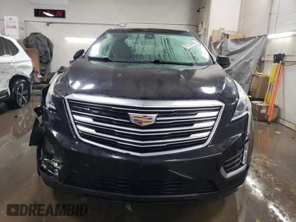 2018 Cadillac XT5 Luxury AWD с VIN 1GYKNDRS4JZ174540, выставлен на аукционе Copart как лот 88206695 с пробегом 69 983 миль миль и Списание • Salvage title. История ставок и продаж доступна на DreamBid. Изображение 5.