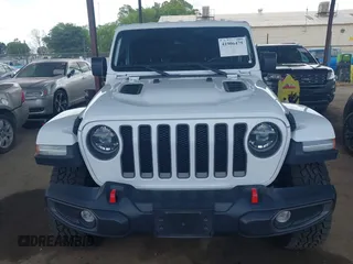 2022 Jeep Wrangler Unlimited Rubicon z VIN 1C4JJXFM6NW234295, wystawiony jako IAAI lot #41906475 z przebiegiem 47 546 mil mil oraz . Historia ofert i sprzedaży dostępna na DreamBid. Obrazek 13.