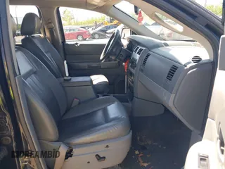 2005 Dodge Durango Limited z VIN 1D8HB58D55F509489, wystawiony jako IAAI lot #42132823 z przebiegiem 162 155 mil mil oraz . Historia ofert i sprzedaży dostępna na DreamBid. Obrazek 5.