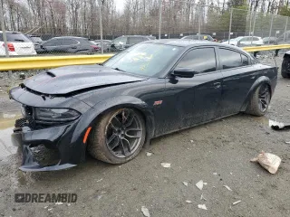 2021 Dodge Charger Scat Pack Widebody with VIN 2C3CDXGJ3MH620792, listed as a Copart auction lot 48355595 with 72,379 mi miles and Salvage Title. Bid and sale history available at carsss.com. Image 1.