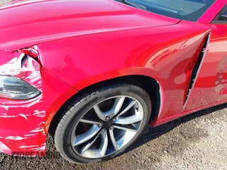 2015 Dodge Charger SXT with VIN 2C3CDXHGXFH858399, listed as a IAAI auction lot 42090958 with 71,488 mi miles and . Bid and sale history available at DreamBid. Image 17.