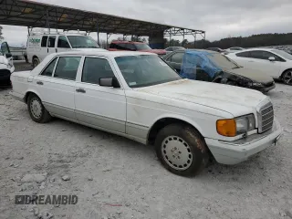 1989 Mercedes-Benz 560 with VIN WDBCA39E0KA469417, listed as a Copart auction lot 43929215 with 52,559 mi miles and Salvage Title. Bid and sale history available at DreamBid. Image 4.