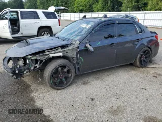 2014 Subaru WRX WRX z VIN JF1GV7E61EG010787, wystawiony jako Copart lot #61637585 z przebiegiem 143 319 mil mil oraz Szkoda całkowita • Salvage title. Historia ofert i sprzedaży dostępna na DreamBid. Obrazek 1.
