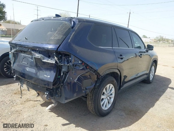 2024 Toyota Grand Highlander XLE with VIN 5TDAAAB59RS059896, listed as a IAAI auction lot 41691709 with 7,294 mi miles. Bid and sale history available at carsss.com. Image 4.