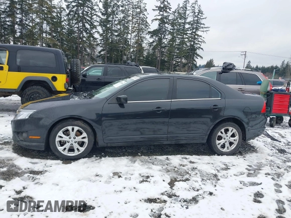 2012 Ford Fusion SE z VIN 3FAHP0HG2CR323380, wystawiony jako IAAI lot #41543660 z przebiegiem 169 059 mil mil oraz . Historia ofert i sprzedaży dostępna na DreamBid. Obrazek 14.