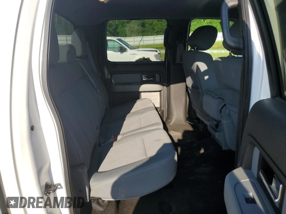 2014 Ford F-150 XL with VIN 1FTFW1EF3EFC97880, listed as a Copart auction lot 64822215 with 105,437 mi miles and Salvage title. Bid and sale history available at DreamBid. Image 10.