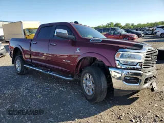 2022 Ram 2500 Laramie with VIN 3C6UR5FLXNG214915, listed as a Copart auction lot 57087055 with 20,588 mi miles and Salvage title. Bid and sale history available at DreamBid. Image 4.