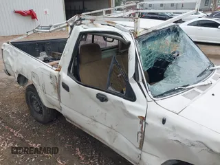 1989 Toyota Pickup DX с VIN JT4RN81P9K0023637, выставлен на аукционе IAAI как лот 42498482 с пробегом 218 937 миль миль и . История ставок и продаж доступна на DreamBid. Изображение 13.