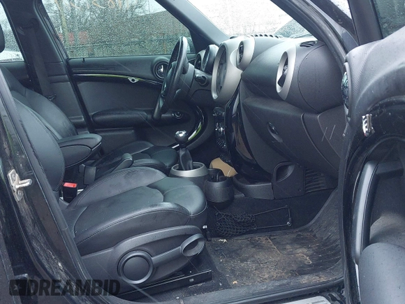 2012 MINI Countryman S with VIN WMWZC3C55CWM26367, listed as a IAAI auction lot 41839371 with 113,577 mi miles and . Bid and sale history available at DreamBid. Image 5.