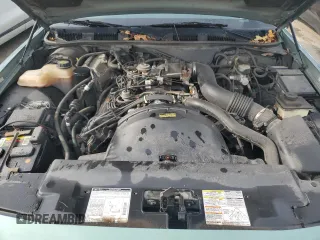 1997 Mercury Grand Marquis GS z VIN 2MELM74W7VX687221, wystawiony jako Copart lot #78665224 z przebiegiem 226 077 mil mil oraz Szkoda całkowita • Salvage title. Historia ofert i sprzedaży dostępna na DreamBid. Obrazek 11.