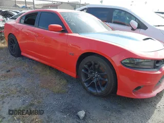 2020 Dodge Charger Scat Pack z VIN 2C3CDXGJ1LH221572, wystawiony jako IAAI lot #41286078 z przebiegiem 67 514 mil mil oraz . Historia ofert i sprzedaży dostępna na DreamBid. Obrazek 1.