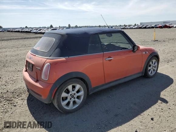 2005 MINI Convertible S with VIN WMWRH33485TF81057, listed as a Copart auction lot 53290165 with 95,123 mi miles and Salvage Title. Bid and sale history available at DreamBid. Image 3.