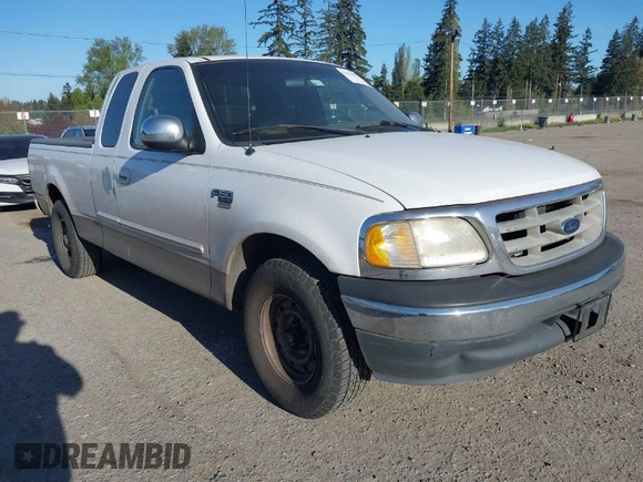 2000 Ford F-150 XL with VIN 1FTRX17W4YKA47244, listed as a IAAI auction lot 42076893 with 362,114 mi miles. Bid and sale history available at carsss.com. Image 1.