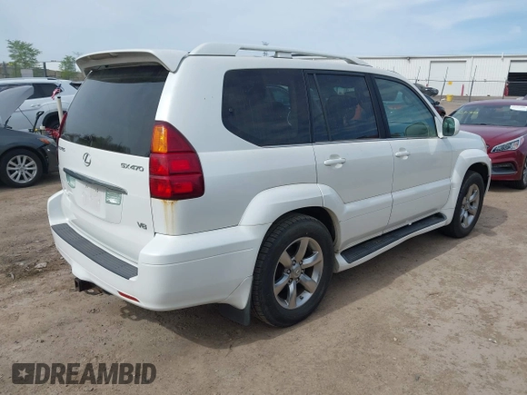 2004 Lexus GX 470 with VIN JTJBT20X440062559, listed as a IAAI auction lot 42142442 with 261,126 mi miles. Bid and sale history available at carsss.com. Image 4.