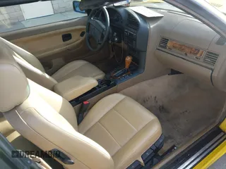 1997 BMW 3-Series 328IC with VIN WBABK8323VET99797, listed as a IAAI auction lot 41616423 with 177,621 mi miles. Bid and sale history available at carsss.com. Image 5.