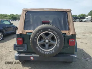 1999 Jeep Wrangler Sahara z VIN 1J4FY49S0XP453920, wystawiony jako Copart lot #61808475 z przebiegiem 129 062 mil mil oraz Czysty tytuł • Clean title. Historia ofert i sprzedaży dostępna na DreamBid. Obrazek 6.