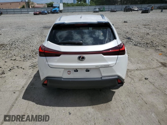2024 Lexus UX 250h Premium z VIN JTHP9JBH4R2071151, wystawiony jako Copart lot #59289934 z przebiegiem 3 861 mil mil oraz Szkoda całkowita • Salvage title. Historia ofert i sprzedaży dostępna na DreamBid. Obrazek 6.