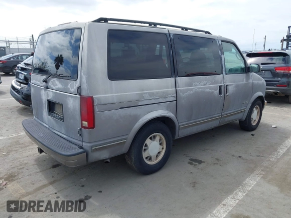 1995 Chevrolet Astro with VIN 1GNDM19W2SB240300, listed as a IAAI auction lot 41885699 with 180,150 mi miles. Bid and sale history available at carsss.com. Image 4.
