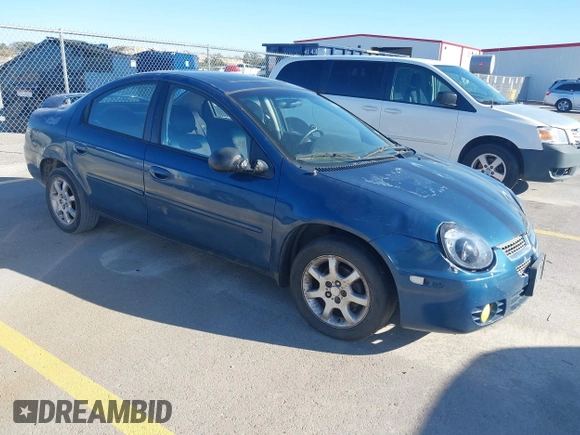 2003 Dodge Neon SXT with VIN 1B3ES56C43D150870, listed as a IAAI auction lot 41478965 with 219,292 mi miles. Bid and sale history available at carsss.com. Image 1.