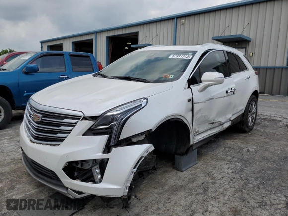 2020 Cadillac XT5 Premium Luxury FWD with VIN 1GYKNCRS5LZ229686, listed as a Copart auction lot 57391915 with 54,491 mi miles and Salvage title. Bid and sale history available at DreamBid. Image 1.